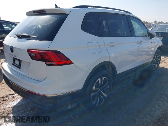2023 Volkswagen Tiguan S z VIN 3VVRB7AX7PM076426, wystawiony jako IAAI lot #41453269 z przebiegiem 63 478 mil mil oraz . Historia ofert i sprzedaży dostępna na DreamBid. Obrazek 4.