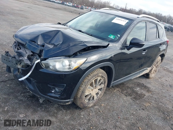 2016 Mazda CX-5 Touring with VIN JM3KE4CY7G0602267, listed as a IAAI auction lot 41854213 with 134,170 mi miles and . Bid and sale history available at carsss.com. Image 17.