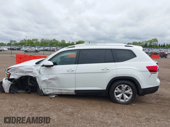 2019 Volkswagen Atlas SE with VIN 1V2UR2CA0KC560799, listed as a IAAI auction lot 42318671 with 95,804 mi miles and . Bid and sale history available at DreamBid. Image 14.