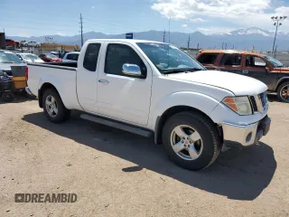 2007 Nissan Frontier SE with VIN 1N6AD06U57C410060, listed as a Copart auction lot 58255225 with 198,277 mi miles and Salvage title. Bid and sale history available at DreamBid. Image 4.