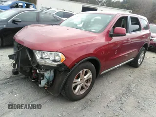 2013 Dodge Durango SXT with VIN 1C4RDHAG0DC694859, listed as a IAAI auction lot 40809655 with 190,130 mi miles and . Bid and sale history available at DreamBid. Image 18.