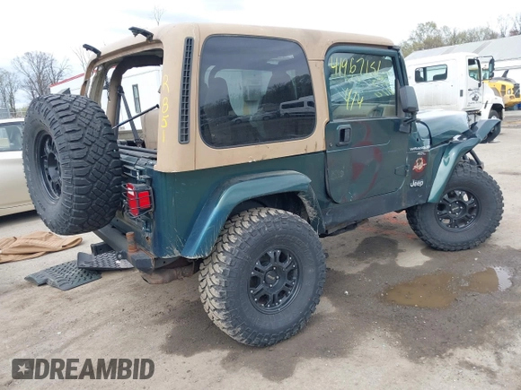 1999 Jeep Wrangler Sahara with VIN 1J4FY49S7XP440582, listed as a IAAI auction lot 41967151 with 163,710 mi miles and . Bid and sale history available at DreamBid. Image 4.