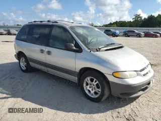 2000 Dodge Caravan SE with VIN 2B4GP45G0YR525310, listed as a Copart auction lot 69596394 with 299,957 mi miles and Salvage Title. Bid and sale history available at carsss.com. Image 4.