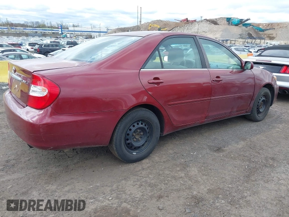 2004 Toyota Camry LE with VIN 4T1BE32K84U307551, listed as a IAAI auction lot 42054571 with 115,513 mi miles. Bid and sale history available at carsss.com. Image 4.