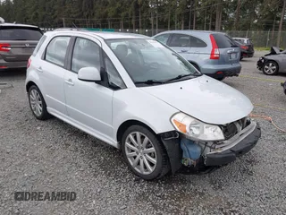 2012 Suzuki SX4 Sportback z VIN JS2YA5A56C6300561, wystawiony jako IAAI lot #42245079 z przebiegiem 82 655 mil mil oraz . Historia ofert i sprzedaży dostępna na DreamBid. Obrazek 1.