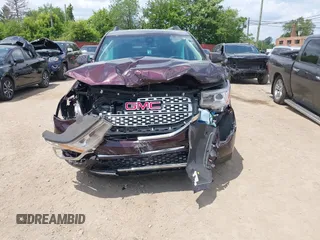2017 GMC Acadia Denali with VIN 1GKKNPLS6HZ311086, listed as a IAAI auction lot 42440540 with 49,948 mi miles and . Bid and sale history available at DreamBid. Image 6.