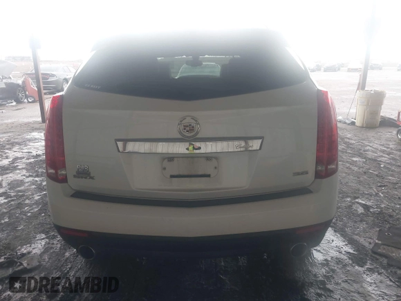 2014 Cadillac SRX z VIN 3GYFNAE32ES580480, wystawiony jako IAAI lot #42170765 z przebiegiem 148 245 mil mil oraz . Historia ofert i sprzedaży dostępna na DreamBid. Obrazek 16.
