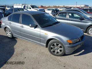 2004 BMW 3 Series 325i with VIN WBAET37414NJ84667, listed as a IAAI auction lot 41723669 with 160,384 mi miles. Bid and sale history available at carsss.com. Image 1.