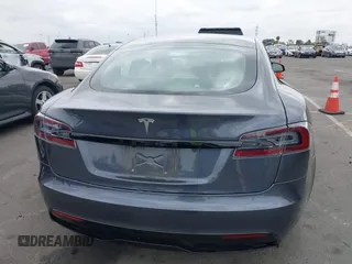 2021 Tesla Model S Long Range с VIN 5YJSA1E57MF441387, выставлен на аукционе IAAI как лот 42034307 с пробегом Не указан миль и . История ставок и продаж доступна на DreamBid. Изображение 16.