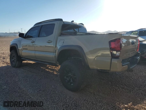 2019 Toyota Tacoma SR z VIN 5TFCZ5AN8KX171793, wystawiony jako Copart lot #57907015 z przebiegiem 96 925 mil mil oraz Szkoda całkowita • Salvage title. Historia ofert i sprzedaży dostępna na DreamBid. Obrazek 2.