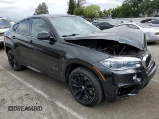 2017 BMW X6 xDrive35i z VIN 5UXKU2C39H0X47816, wystawiony jako Copart lot #53553385 z przebiegiem 123 036 mil mil oraz Szkoda całkowita • Salvage title. Historia ofert i sprzedaży dostępna na DreamBid. Obrazek 4.