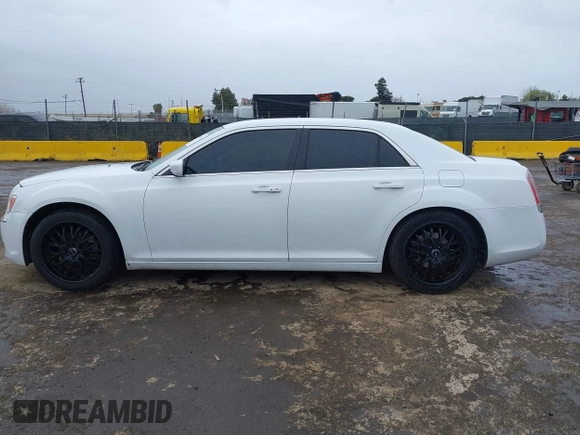 2014 Chrysler 300 with VIN 2C3CCAAG2EH235495, listed as a IAAI auction lot 41787801 with 142,354 mi miles and . Bid and sale history available at DreamBid. Image 14.