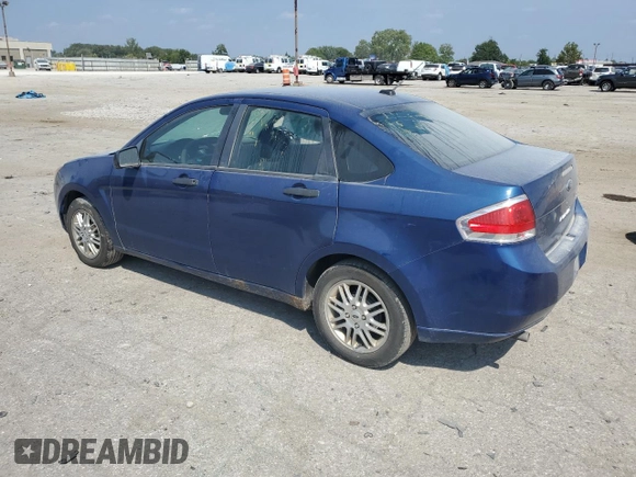 2009 Ford Focus SE with VIN 1FAHP35N69W173977, listed as a Copart auction lot 69018554 with 138,496 mi miles and Salvage Title. Bid and sale history available at DreamBid. Image 2.