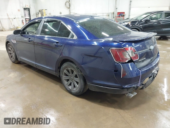 2011 Ford Taurus SE with VIN 1FAHP2DW4BG187235, listed as a IAAI auction lot 41942952 with 162,083 mi miles. Bid and sale history available at carsss.com. Image 3.