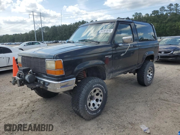 1990 Ford Bronco with VIN 1FMCU14T9LUA15536, listed as a Copart auction lot 54391815 with 319,124 mi miles and Salvage title. Bid and sale history available at DreamBid. Image 1.