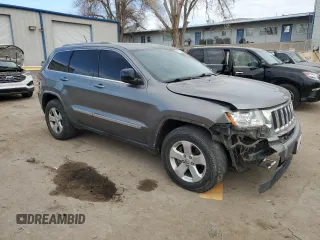 2012 Jeep Grand Cherokee Laredo with VIN 1C4RJFAT3CC204245, listed as a Copart auction lot 41707195 with 172,014 mi miles and Salvage Title. Bid and sale history available at carsss.com. Image 4.