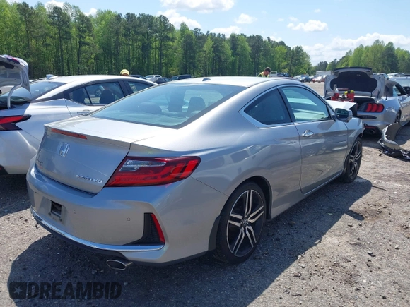 2016 Honda Accord Touring with VIN 1HGCT2B03GA000691, listed as a IAAI auction lot 42009414 with 70,306 mi miles and . Bid and sale history available at DreamBid. Image 4.