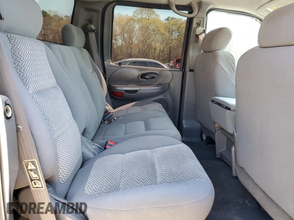 2003 Ford F-150 XLT with VIN 1FTRW08L63KB47470, listed as a Copart auction lot 50400055 with 223,859 mi miles and Salvage Title. Bid and sale history available at carsss.com. Image 10.