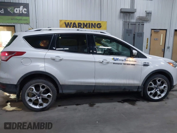 2016 Ford Escape Titanium with VIN 1FMCU9J94GUC79910, listed as a IAAI auction lot 41644467 with 43,261 mi miles. Bid and sale history available at carsss.com. Image 13.