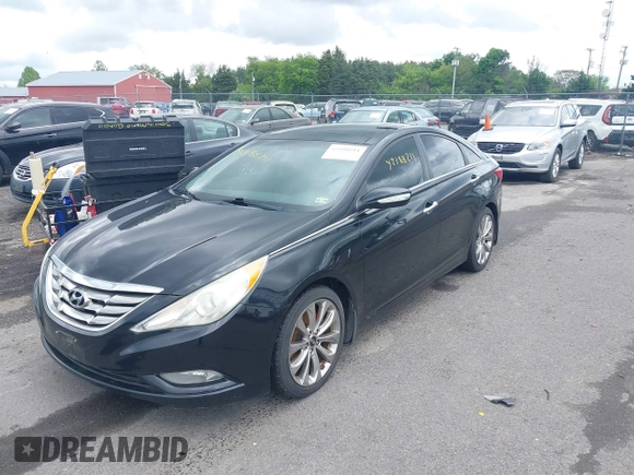 2012 Hyundai Sonata SE with VIN 5NPEC4AB7CH408636, listed as a IAAI auction lot 42188211 with 197,665 mi miles and . Bid and sale history available at carsss.com. Image 2.