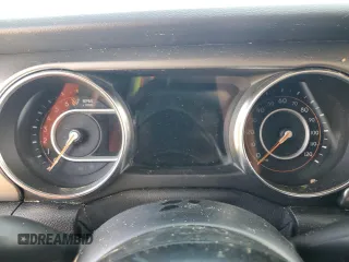 2021 Jeep Gladiator Sport S z VIN 1C6HJTAGXML513426, wystawiony jako Copart lot #58844025 z przebiegiem Nie podano mil oraz Szkody całkowita. Historia ofert i sprzedaży dostępna na DreamBid. Obrazek 9.