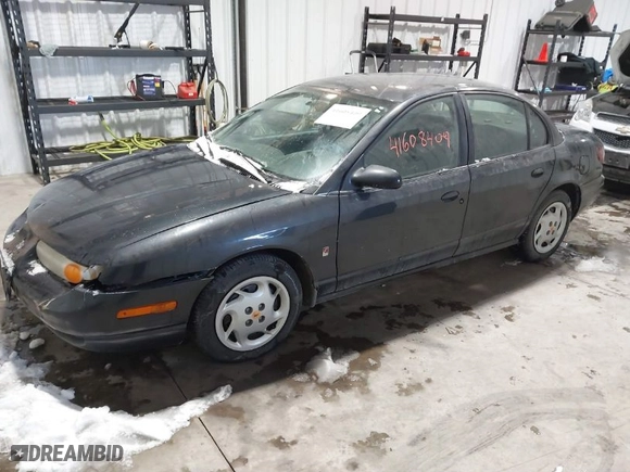2002 Saturn SL with VIN 1G8ZK52712Z291299, listed as a IAAI auction lot 41608409 with 249,442 mi miles. Bid and sale history available at carsss.com. Image 2.