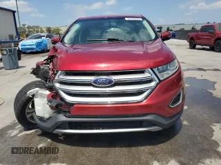 2015 Ford Edge Titanium z VIN 2FMTK3K87FBB30209, wystawiony jako Copart lot #57725425 z przebiegiem 85 562 mil mil oraz Szkoda całkowita • Salvage title. Historia ofert i sprzedaży dostępna na DreamBid. Obrazek 5.