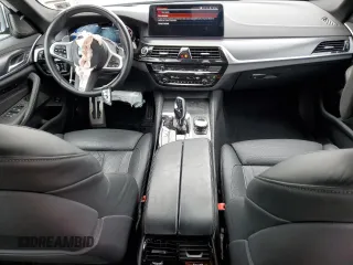 2023 BMW 5 Series M550i xDrive with VIN WBA13BK06PCN02733, listed as a Copart auction lot 48767235 with 27,725 mi miles and Salvage title. Bid and sale history available at DreamBid. Image 8.