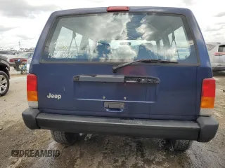 1997 Jeep Cherokee SE with VIN 1J4FT27P0VL612859, listed as a Copart auction lot 49869915 with 198,702 mi miles and Salvage title. Bid and sale history available at DreamBid. Image 6.
