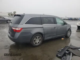 2011 Honda Odyssey EX-L with VIN 5FNRL5H64BB050425, listed as a Copart auction lot 49101795 with 192,238 mi miles and Salvage Title. Bid and sale history available at carsss.com. Image 3.