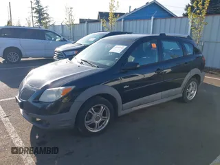 2007 Pontiac Vibe with VIN 5Y2SL65807Z410689, listed as a IAAI auction lot 42036169 with 203,112 mi miles. Bid and sale history available at carsss.com. Image 2.