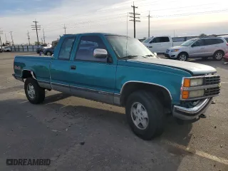 1993 Chevrolet C/K 1500 with VIN 2GCEK19Z2P1244688, listed as a Copart auction lot 80684414 with 115,383 mi miles and Salvage Title. Bid and sale history available at carsss.com. Image 4.