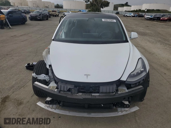 2019 Tesla Model 3 Mid Range with VIN 5YJ3E1EA8KF412886, listed as a Copart auction lot 50824565 with 54,803 mi miles and Salvage Title. Bid and sale history available at carsss.com. Image 5.