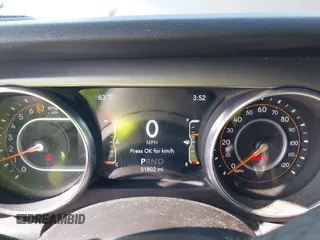 2020 Jeep Wrangler Unlimited Sport Altitude with VIN 1C4HJXDG7LW215344, listed as a IAAI auction lot 41924460 with 51,802 mi miles and . Bid and sale history available at DreamBid. Image 7.