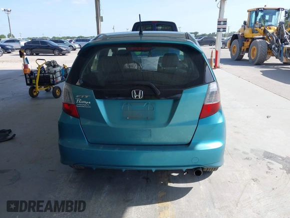 2013 Honda Fit Sport z VIN JHMGE8H54DC026019, wystawiony jako IAAI lot #42125500 z przebiegiem 139 285 mil mil oraz . Historia ofert i sprzedaży dostępna na DreamBid. Obrazek 16.