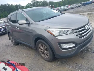 2016 Hyundai Santa Fe z VIN 5XYZU3LB1GG358111, wystawiony jako IAAI lot #42377494 z przebiegiem 92 745 mil mil oraz . Historia ofert i sprzedaży dostępna na DreamBid. Obrazek 1.