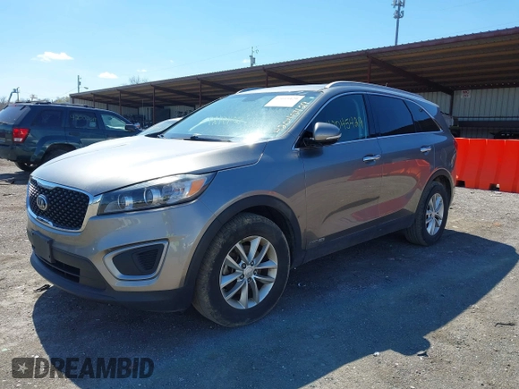 2016 Kia Sorento LX z VIN 5XYPGDA55GG110302, wystawiony jako IAAI lot #42045429 z przebiegiem 166 368 mil mil oraz . Historia ofert i sprzedaży dostępna na DreamBid. Obrazek 18.