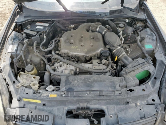 2004 Infiniti G35 w/Leather z VIN JNKCV54E34M826310, wystawiony jako Copart lot #59636735 z przebiegiem 215 769 mil mil oraz Szkoda całkowita • Salvage title. Historia ofert i sprzedaży dostępna na DreamBid. Obrazek 11.
