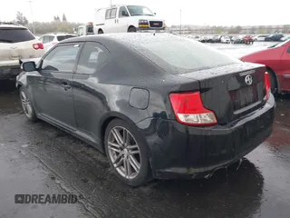 2013 Scion tC with VIN JTKJF5C74D3065648, listed as a IAAI auction lot 41974509 with 97,669 mi miles. Bid and sale history available at carsss.com. Image 3.