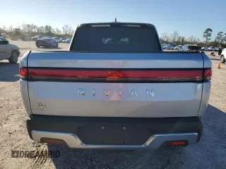 2023 Rivian R1T Adventure with VIN 7FCTGAAA3PN020577, listed as a Copart auction lot 84847414 with 7,888 mi miles and Salvage Title. Bid and sale history available at carsss.com. Image 6.