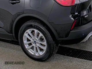 2021 Ford Escape SE with VIN 1FMCU9G64MUA42925, listed as a IAAI auction lot 42858756 with 79,685 mi miles and . Bid and sale history available at DreamBid. Image 6.