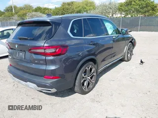 2021 BMW X5 sDrive40i with VIN 5UXCR4C01M9G07906, listed as a IAAI auction lot 41847036 with 16,307 mi miles. Bid and sale history available at carsss.com. Image 4.