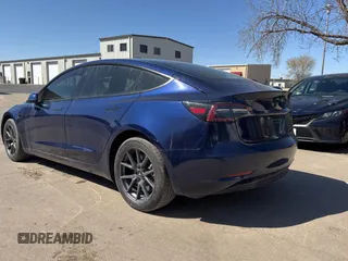 2023 Tesla Model 3 Long Range with VIN 5YJ3E1EB1PF625677, listed as a Copart auction lot 52424245 with 12,817 mi miles and Salvage Title. Bid and sale history available at DreamBid. Image 3.