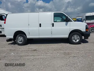 2020 Chevrolet Express Cargo with VIN 1GCWGAFG8L1173280, listed as a IAAI auction lot 42434124 with 157,399 mi miles and . Bid and sale history available at DreamBid. Image 13.