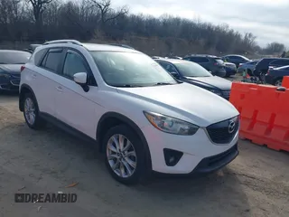 2015 Mazda CX-5 Grand Touring with VIN JM3KE2DY1F0474660, listed as a IAAI auction lot 41554648 with 196,201 mi miles. Bid and sale history available at carsss.com. Image 1.