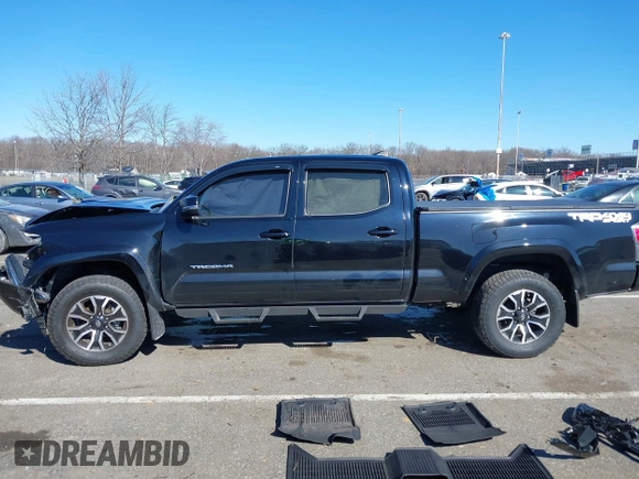 2021 Toyota Tacoma 4WD SR5 with VIN 3TMDZ5BN4MM117564, listed as a IAAI auction lot 41629220 with 77,063 mi miles. Bid and sale history available at carsss.com. Image 15.