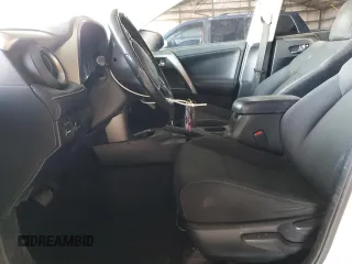 2018 Toyota RAV4 XLE with VIN JTMWFREV2JJ740145, listed as a Copart auction lot 52214075 with 129,940 mi miles and Salvage title. Bid and sale history available at DreamBid. Image 7.