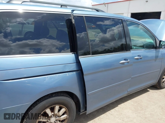 2010 Honda Odyssey EX-L with VIN 5FNRL3H69AB088994, listed as a IAAI auction lot 42007982 with 187,180 mi miles and . Bid and sale history available at DreamBid. Image 6.