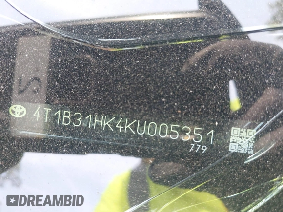 2019 Toyota Camry Hybrid LE z VIN 4T1B31HK4KU005351, wystawiony jako IAAI lot #42162802 z przebiegiem 89 187 mil mil oraz . Historia ofert i sprzedaży dostępna na DreamBid. Obrazek 9.