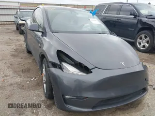 2023 Tesla Model Y Long Range with VIN 7SAYGAEE8PF587202, listed as a IAAI auction lot 41306811 with 1 mi miles. Bid and sale history available at carsss.com. Image 1.